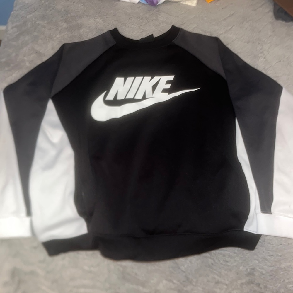 Black, grey, and white nike crew neck with pockets
